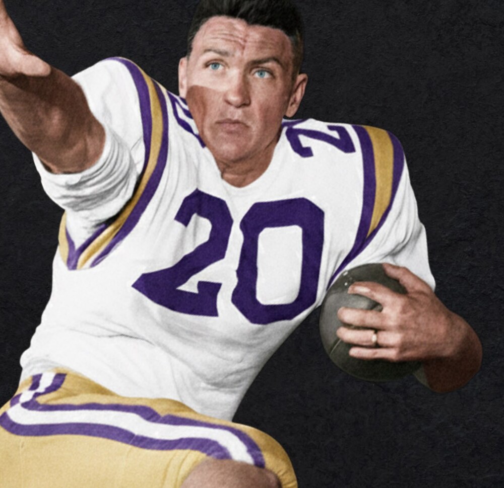 Billy Cannon in his LSU jersey, running with the ball